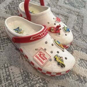 White and Red Crocs with Toy Story Charms.
